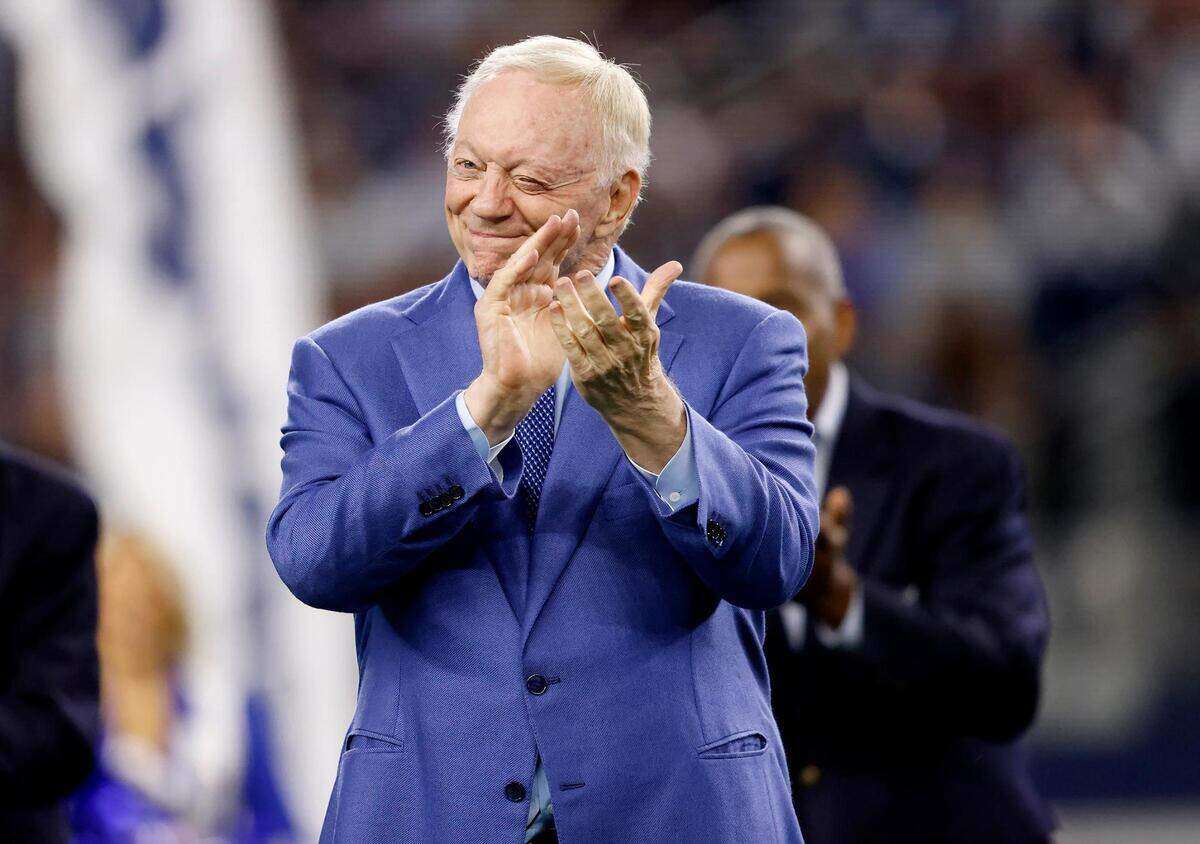Dallas Cowboys owner Jerry Jones applauded Jimmy Johnson during a ceremony to induct him into the Ring of Honor on Saturday, December 30, 2023.