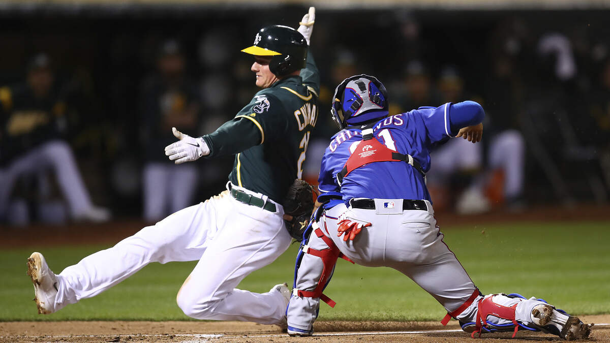 Matt Chapman was out at the plate ... until the ball fell out of Robinson Chirinos' glove for the first of four A's runs in the fourth inning Wednesday night.