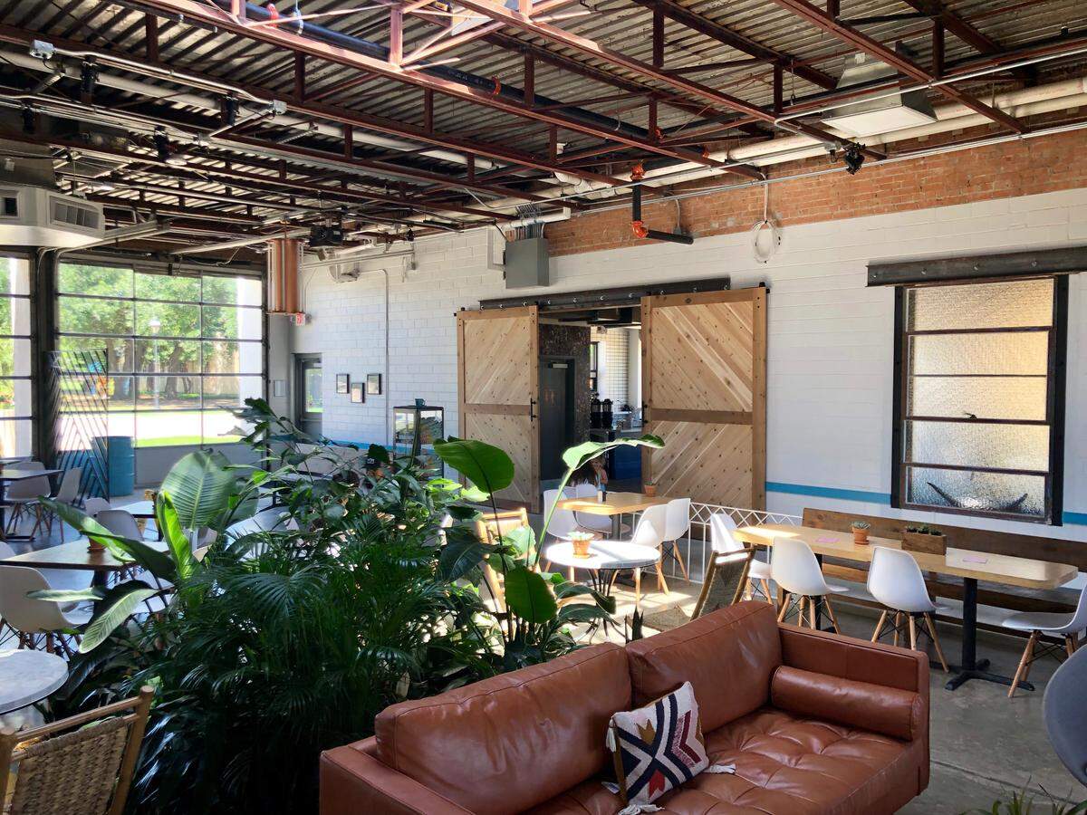 The former firehouse bays are an airy dining area at FireHouse Gastro Park in Grand Prairie