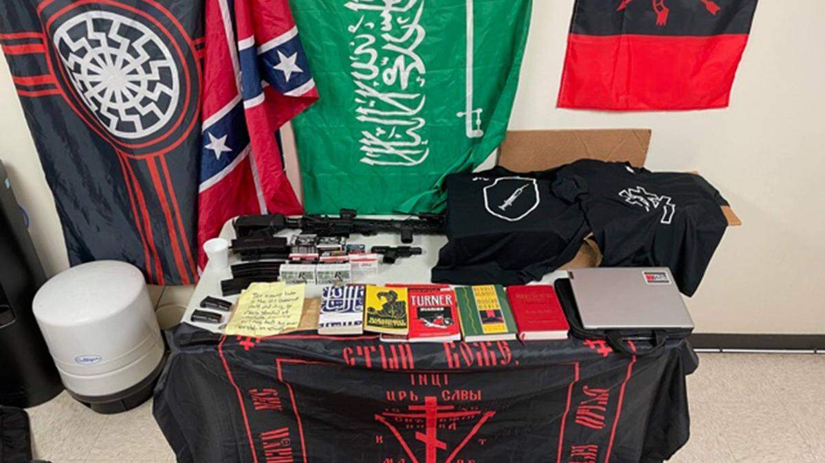 Coleman Blevins had guns, ammunition and racial paraphernalia at his home representing his extremist ideologies, cops say.