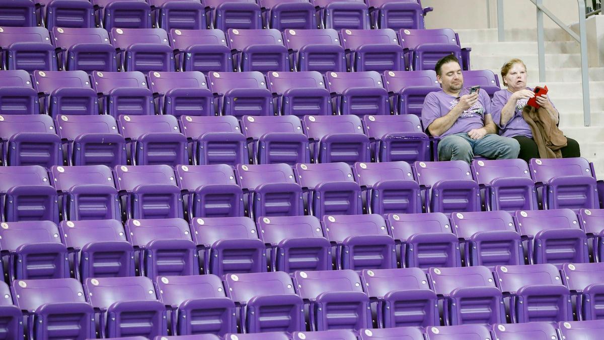 Sections that were crowded earlier only held the most die-hard fans late during the CFP national championship football game watch party at Schollmeier Arena, in Fort Worth, Texas, Monday, Jan. 9, 2023. The Georgia Bulldogs defatted TCU Horned Frogs 65-7.