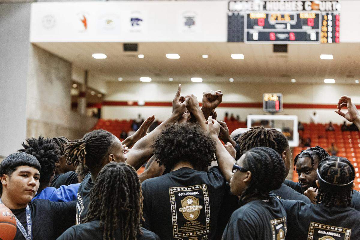 Eastern Hills boys basketball huddles up during district game against Fort Worth Dunbar on Thursday, Jan. 2, 2024.