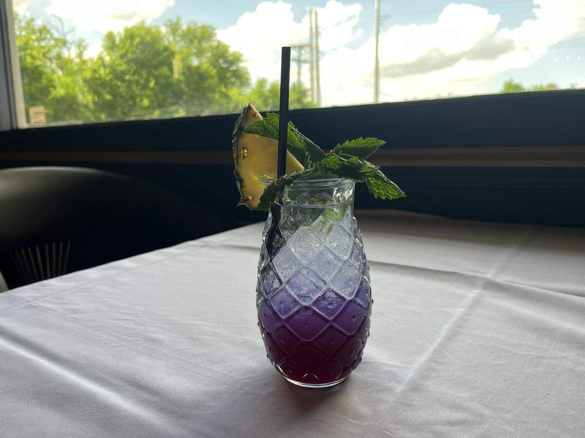The prohibition mocktail at Theodore’s Steakhouse uses apple cider vinegar simple syrup with pineapple, jalapeno and butterfly pea flower tea.
