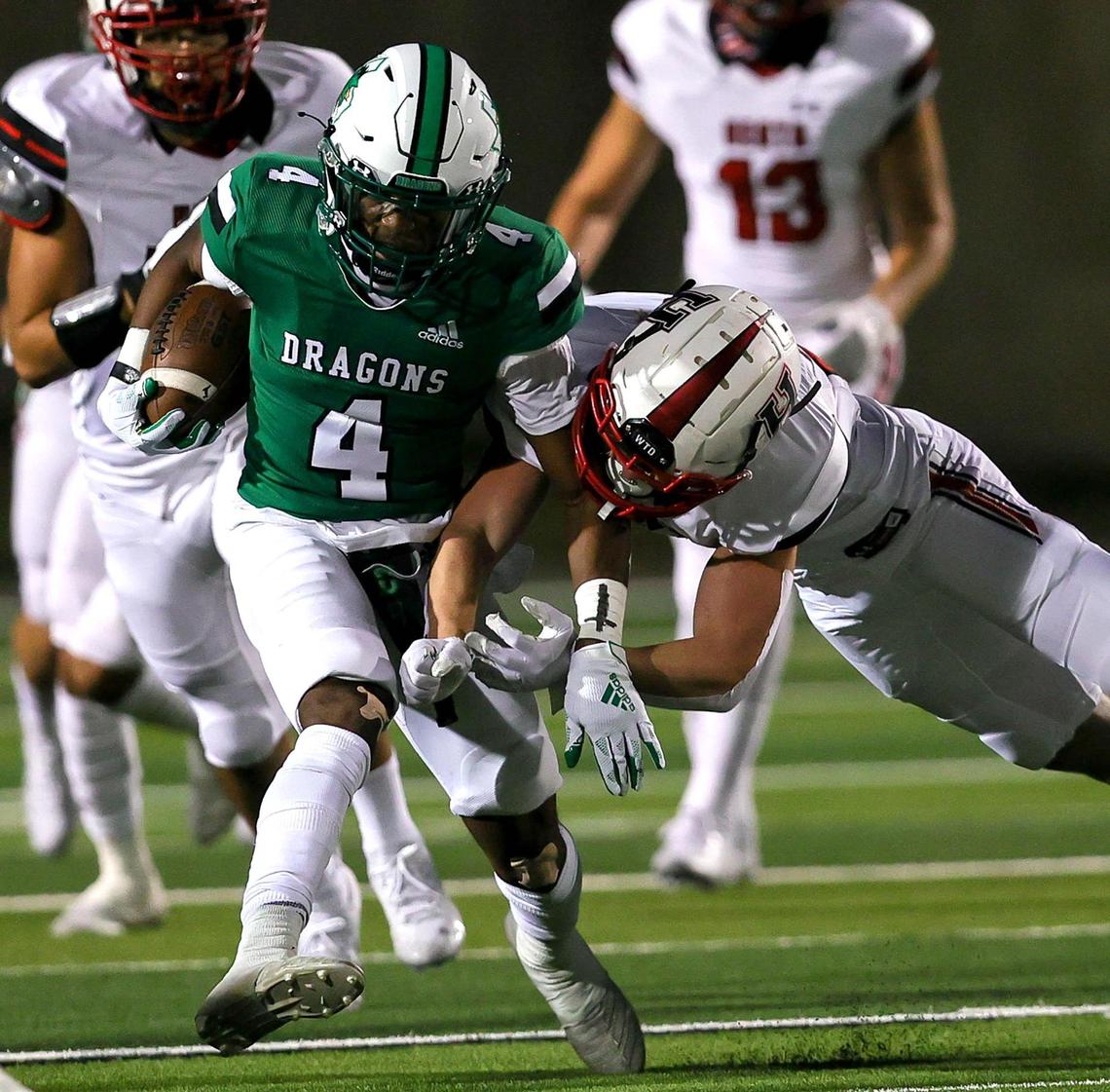 Southlake Carroll kickoff returner Cinque Williams tries to break a tackle against Rockwall Heath during the first half of a High School Football game, Friday night, October 2, 2020 played at Dragon Stadium in Southlake, TX. (Steve Nurenberg Special to the Star-Telgram)