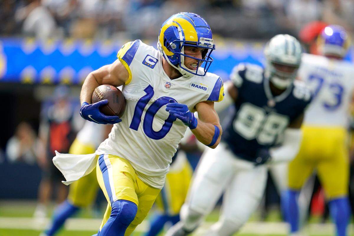 Los Angeles Rams wide receiver Cooper Kupp (10) sprints to the end zone for a touchdown in the first half of an NFL football game against the Dallas Cowboys, Sunday, Oct. 9, 2022, in Inglewood, Calif. (AP Photo/Marcio Jose Sanchez)