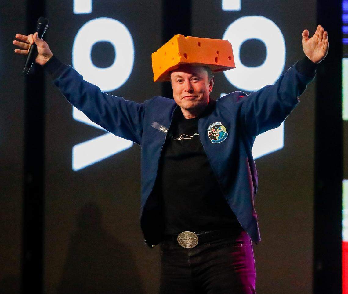 Billionaire Elon Musk wears a cheesehead as he takes the stage during a town hall on Sunday, March 30, 2025, at the KI Convention Center in Green Bay, Wis. Musk held the event to drive turnout for Tuesday's state Supreme Court election between Brad Schimel and Susan Crawford.