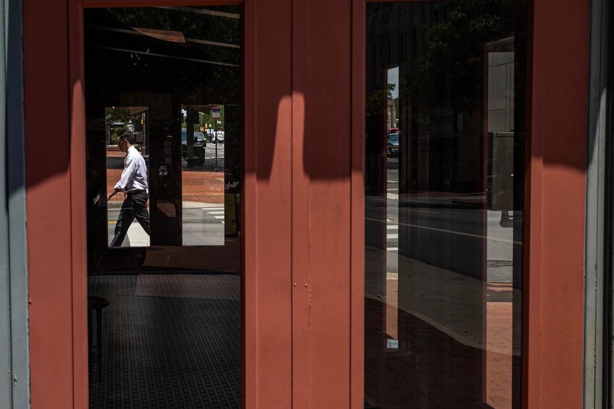 A man walks by the empty and closed Pizzeria Uno Restaurant & Bar on Houston Street in downtown Fort Worth on Wednesday, July 24, 2024.