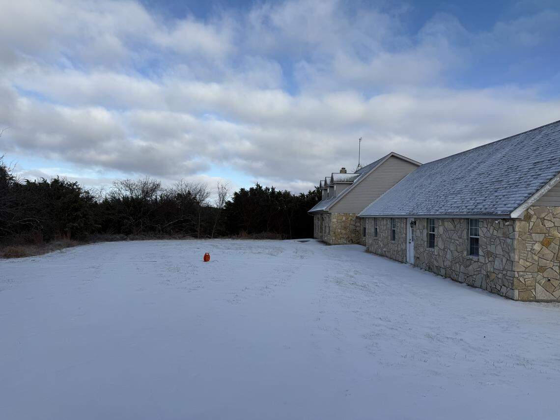 About 2 inches of sleet and snow on the ground south of Granbury in Hood County on Sunday morning.