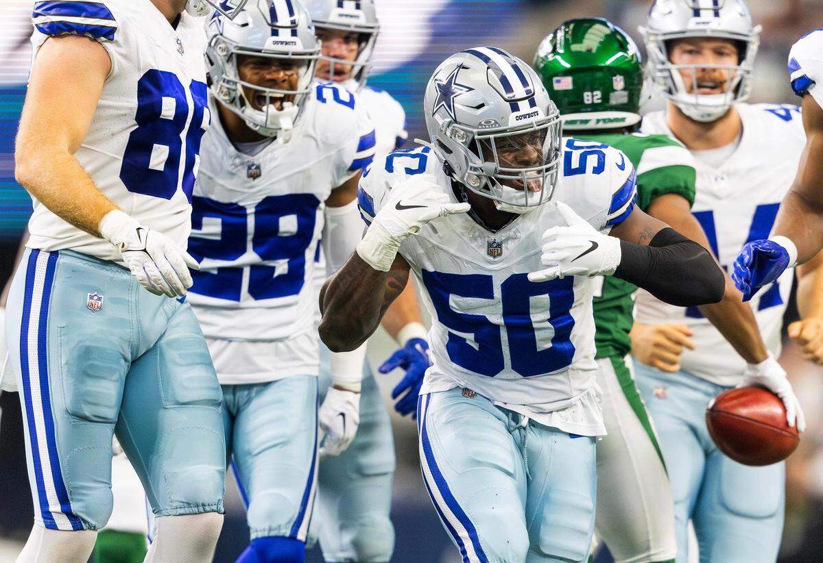 Dallas Cowboys linebacker Devin Harper (50) celebrates with teammates against the New York Jets on Sunday, September 17, 2023, at AT&T Stadium in Arlington.