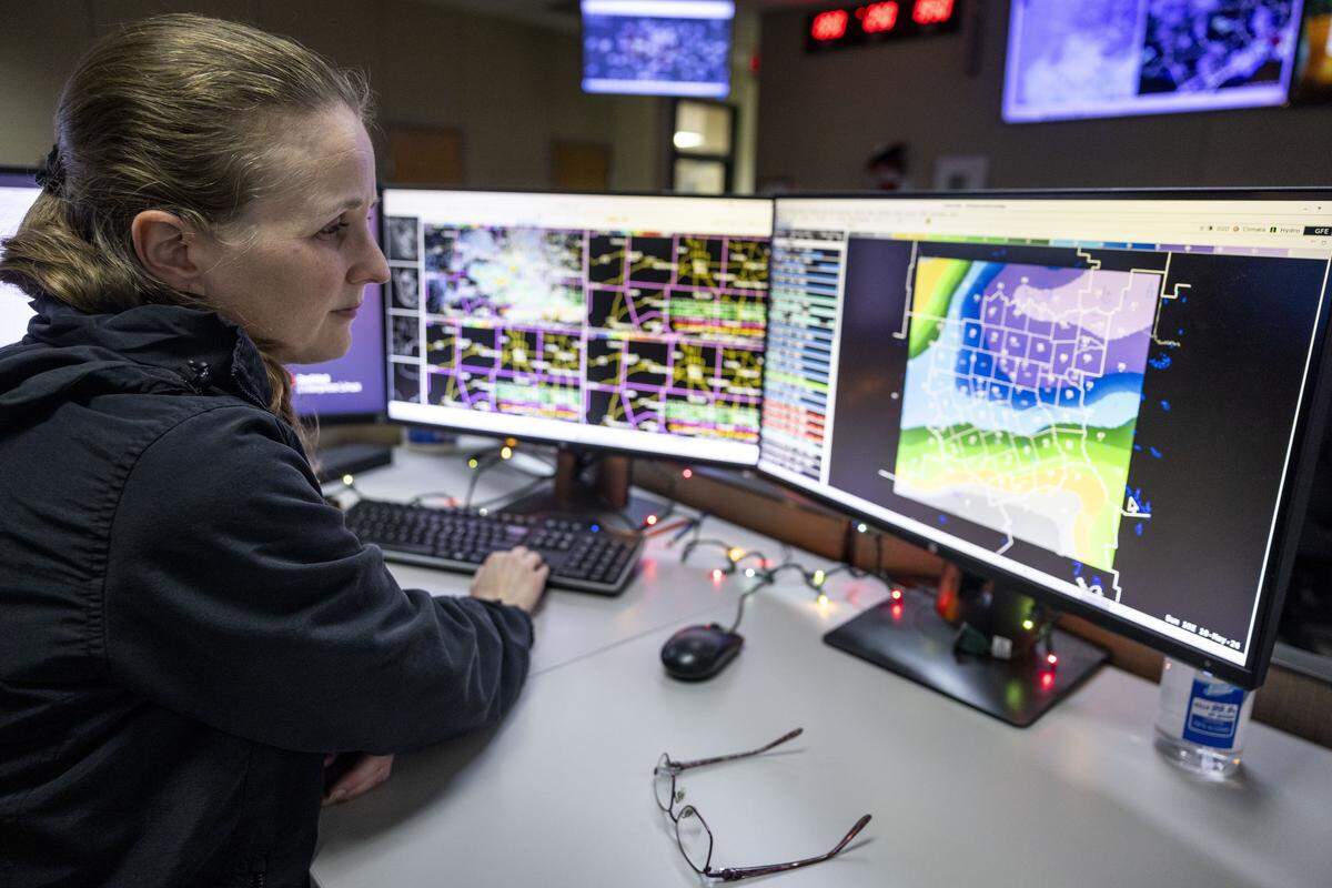 Senior Service Hydrologist Amanda Schroeder looks at a graphical forecast editor at the National Weather Service Fort Worth office on Friday, May 8, 2026 in Fort Worth, Texas. The Graphical forecast editor is used by meteorologists to create weather forecasts in gridded digital form.