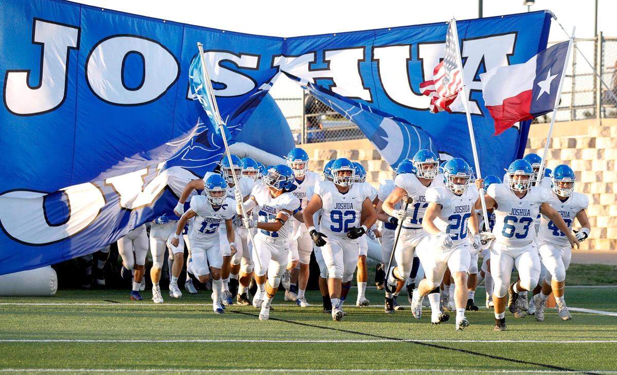 The Joshua Owls enter the field to face Mansfield Timberview, Thursday night, September 23, 2021 played at Newsom Stadium in Mansfield, TX. (Steve Nurenberg Special to the Star-Telegram)