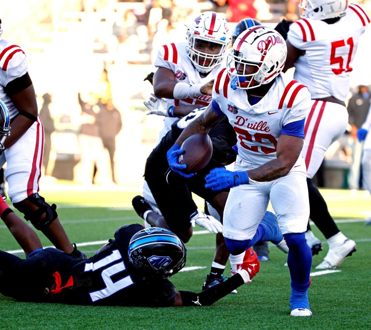 Duncanville running back Caden Durham (29) breaks around the left side during the first half of a UIL Conference 6A Division I state semifinal football playoff game at Mesquite Memorial Stadium in Mesquite, Texas, Saturday, Dec. 09, 2023. Duncanville led North Crowley 24-0 at the half.