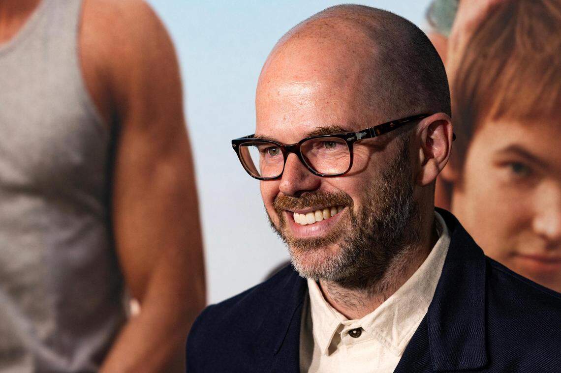 Director Sean Durkin poses for photos on the red carpet for the world premiere of his movie “The Iron Claw,” at the Texas Theater in Dallas on Wednesday, Nov. 8, 2023.
