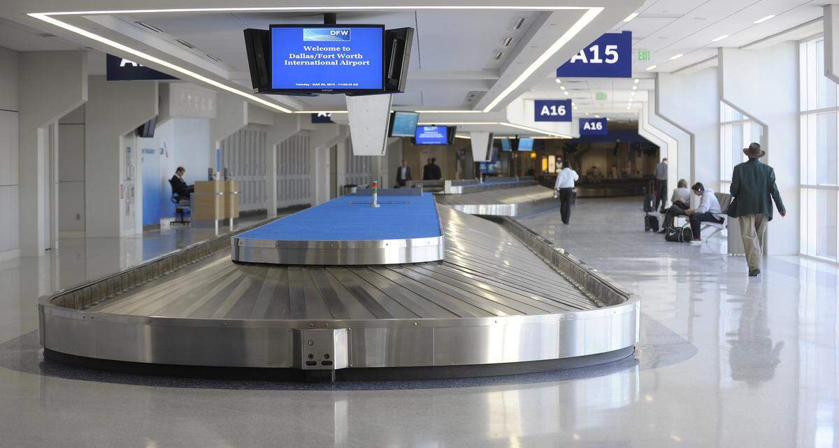 An empty baggage claim at Terminal A at the Dallas Fort Worth airport.