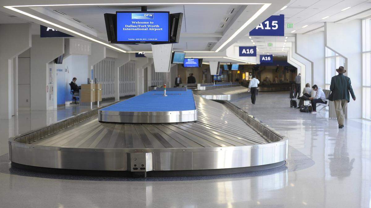 An empty baggage claim at Terminal A at the Dallas Fort Worth airport.
