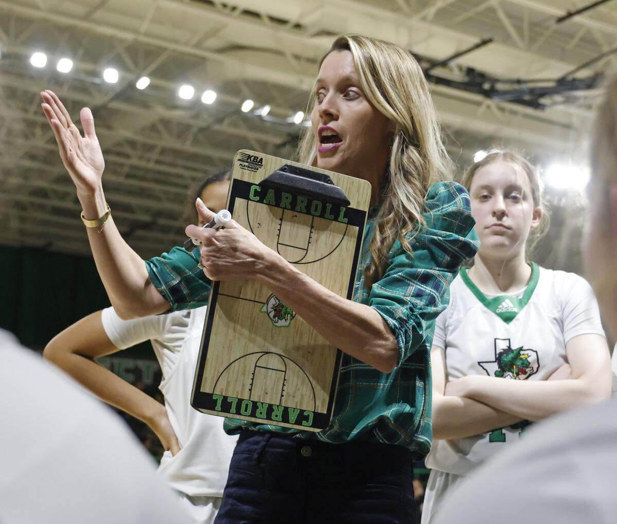 Southlake head coach Robyn McCoart talks to the team during a timeout against L.D. Bell in  the second half of a UIL girls basketball game between L.D. Bell and Southlake Carroll at Southlake Senior High School in Southlake, Texas, Tuesday Feb. 03, 2026