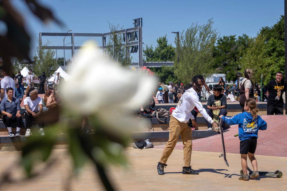 A young skater helps recover a board after another wiped out at the Dickies Skate Plaza in Fire Station Park on Saturday, April 29, 2023 in Fort Worth. The opening day event featured live music, food trucks and local vendors like Magnolia Skate Shop.