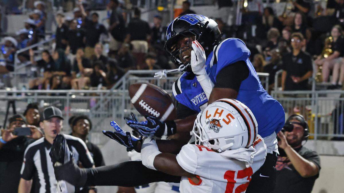 North Crowley wide receiver Damarion Mays (2) grabs a touchdown pass defended by Lancaster defensive back Tristan Nobles (12) during the second half Aug. 28 at Crowley ISD Stadium.
