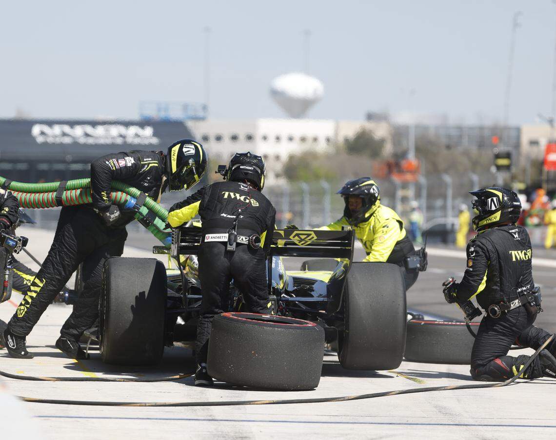 The pit crew works on the Andretti car driven by Will Power (26) during the inaugural Java House Grand Prix of Arlington in Arlington, Texas, Sunday, March, 15, 2026.
