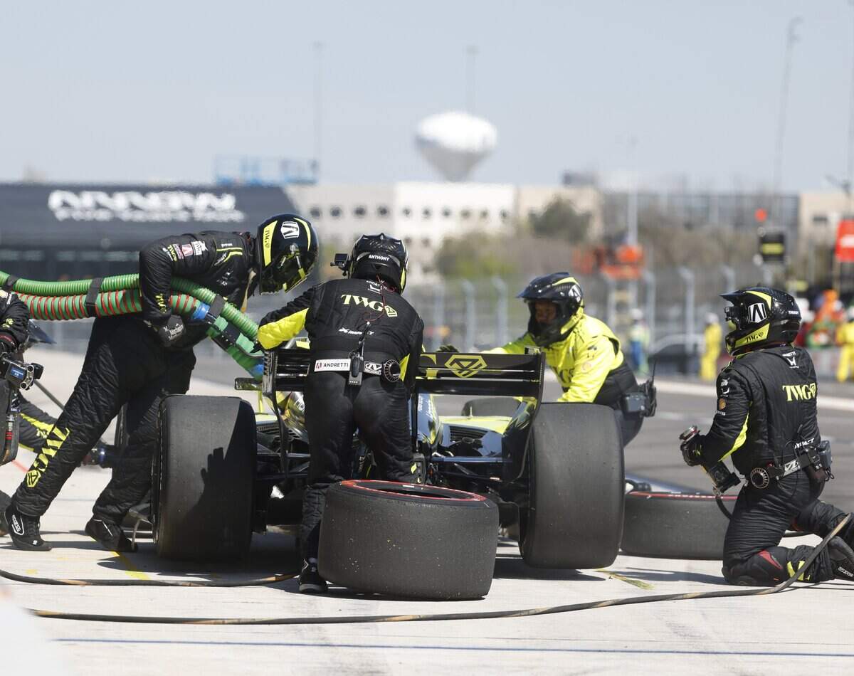 The pit crew works on the Andretti car driven by Will Power (26) during the inaugural Java House Grand Prix of Arlington in Arlington, Texas, Sunday, March, 15, 2026.