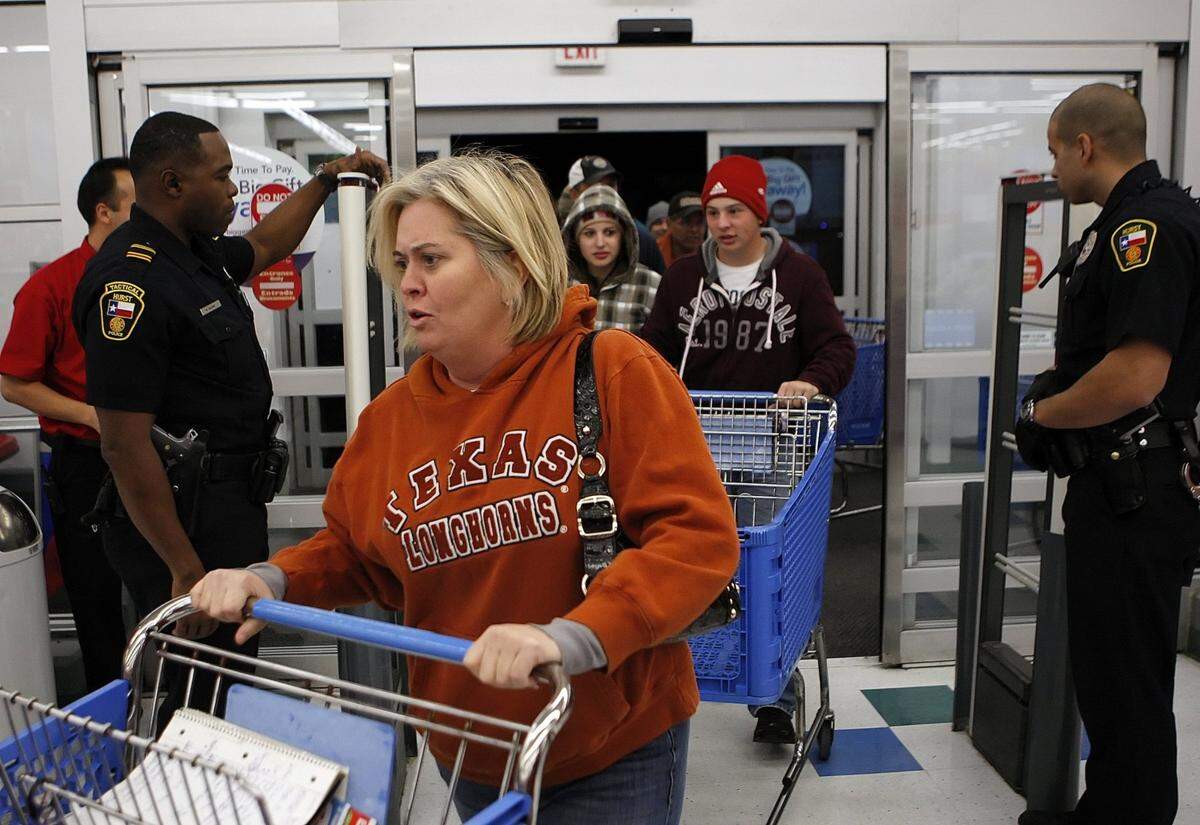 2009: The first Black Friday shoppers enter the Toys ‘R’ Us near Northeast Mall in Hurst just after the store’s midnight opening. Several thousand people stood in line looking for deals.