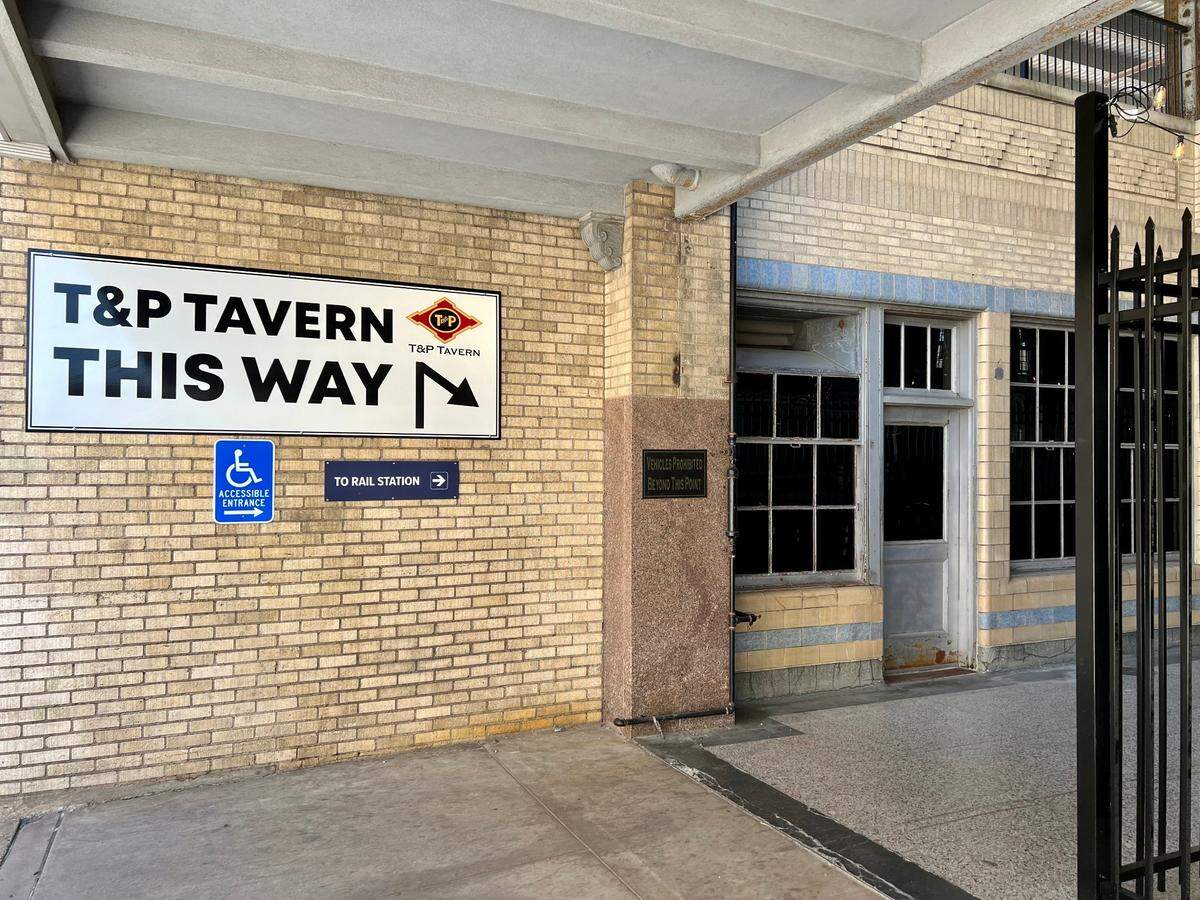 T & P Tavern is down a driveway at the east end of the historic T & P Railway station concourse, as seen August 6, 2023.