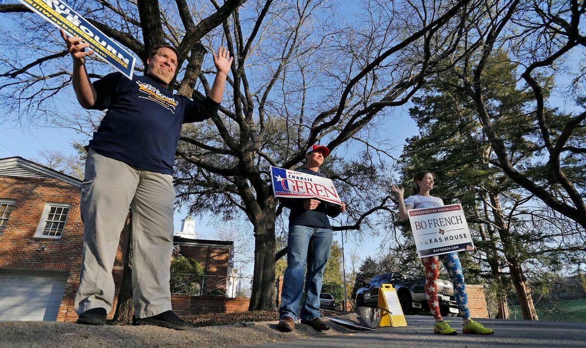 March 1, 2016: Candidate volunteers Sean Mullins (Bill Waybourn), Ryan Zelazny (Charlie Geren) and Sheridan French (Bo French) greeting voters outside of the Westover Hills Town Hall on Super Tuesday.