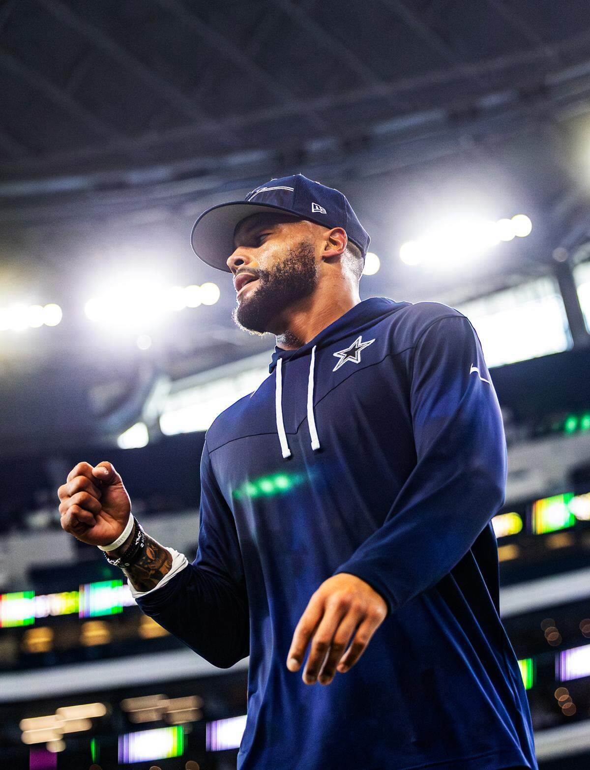 Dallas Cowboys Quarterback Dak Prescott wraps up a workout with his trainers prior to a preseason match up against the Las Vegas Raiders at AT&T Stadium in Arlington on Aug. 26, 2023.