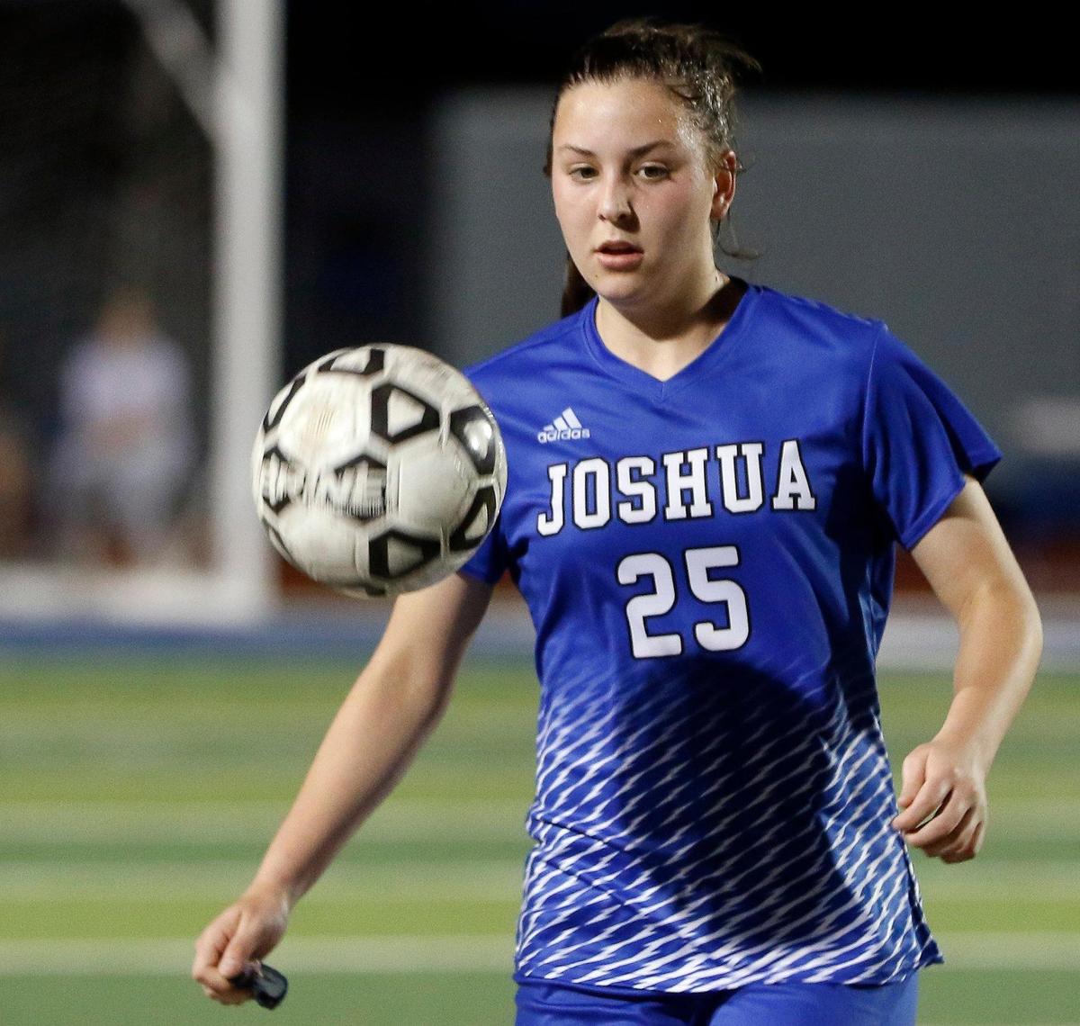 Joshua’s Graycen Rasmussen (25) keeps an eye on the ball during a District 14-5A high school soccer game at Joshua High School in Joshua, Texas, Monday, March 08, 2021. The girls played to a scoreless game. (Special to the Star-Telegram Bob Booth)