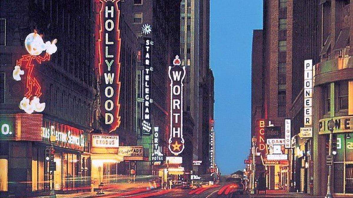 Reddy Kilowatt is visible at left on the Texas Electric Service Co. building in this image of West Seventh Street in Fort Worth from the 1960s.