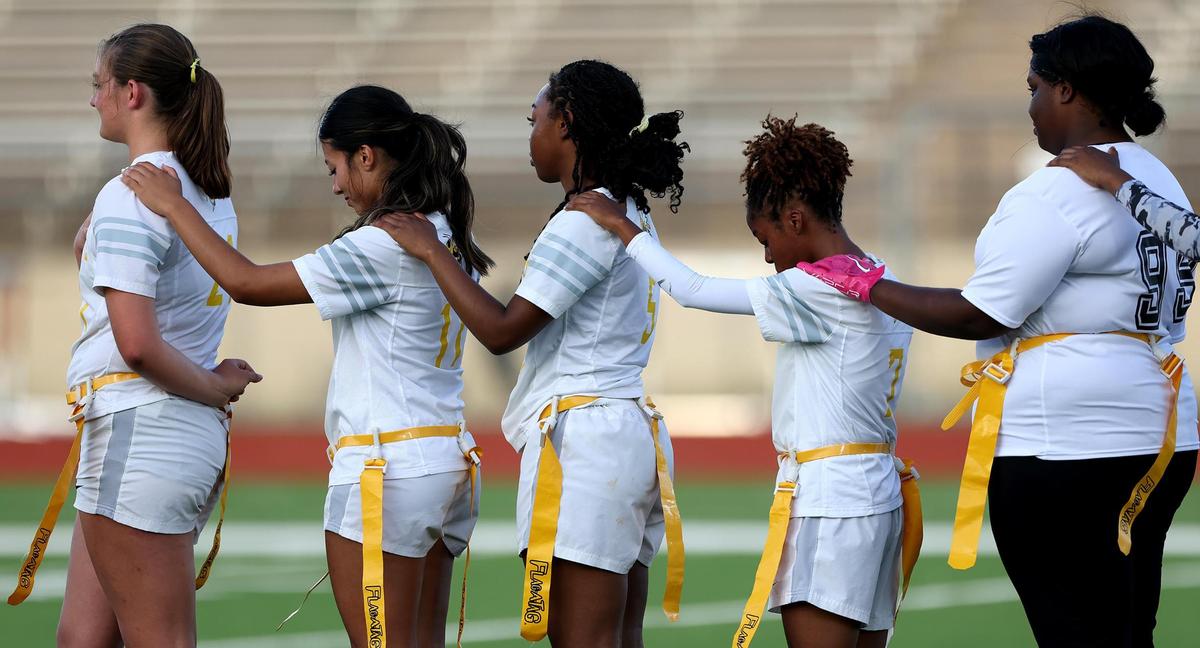Members of the Arlington Heights flag football team before the start of the championship against Paschal on Tuesday, May 13, 2025, at Herman Clark Stadium.