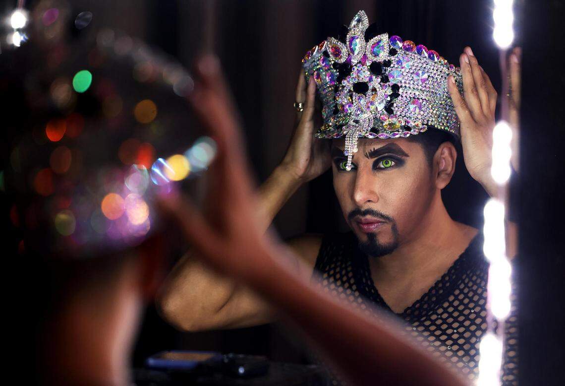 Patrick Mikyles puts on his makeup while preparing for his interactive drag show, Drag With Me Brunch, at Red Goose Saloon in downtown Fort Worth on Saturday, June 3, 2023.