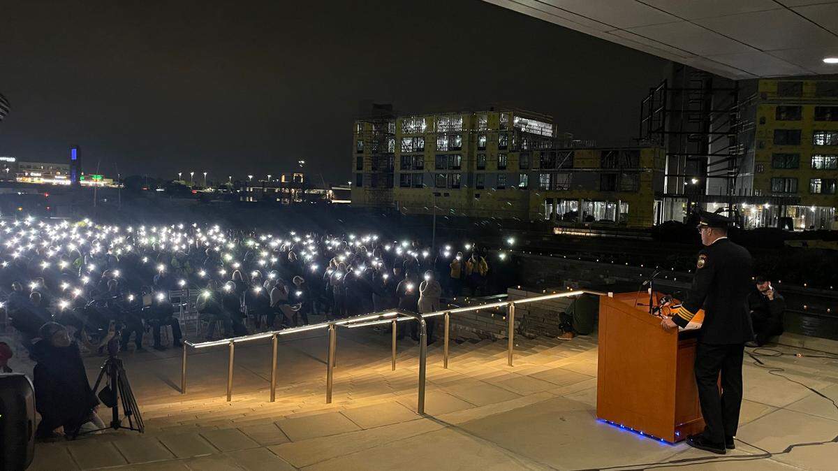 Hundreds gathered outside the Grand Prairie Police Department headquarters on Friday night for a vigil honoring Brandon Tsai, the 32-year-old police officer killed in a crash while pursuing a suspect.
