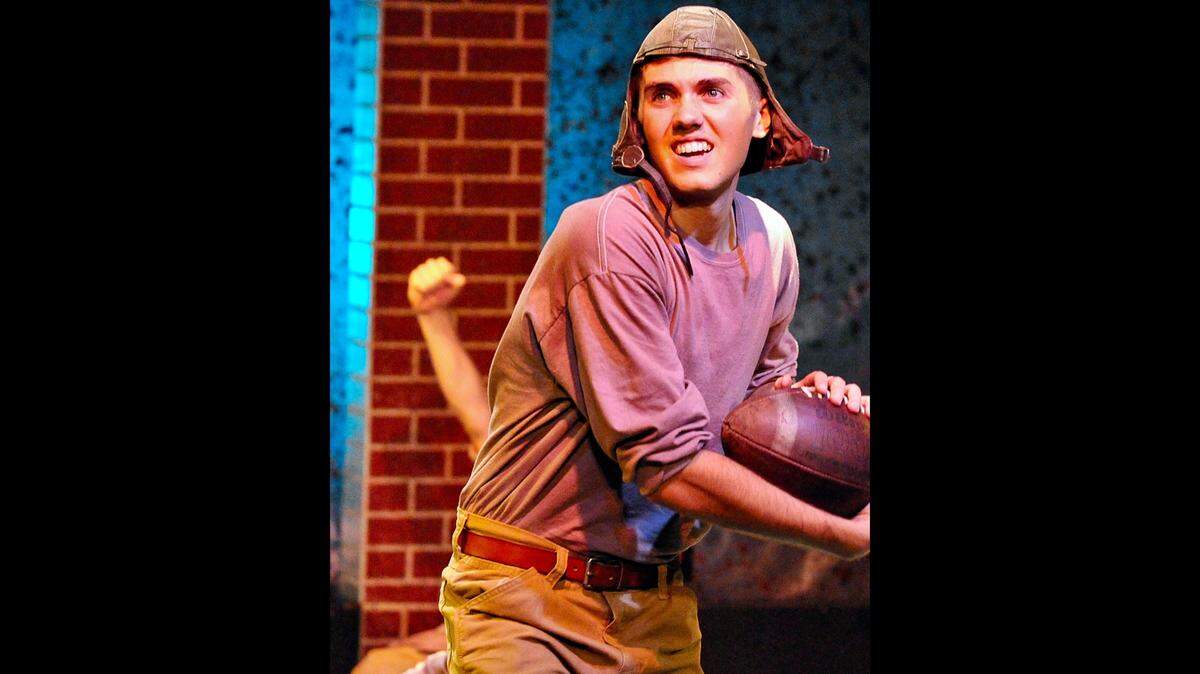 Bo McMillan (Cody Rees, center) ready to lead Centre College to victory in a Kentucky theater’s play, “The Wonder Team,” about the Colonels team that defeated TCU 63-7 in 1921.