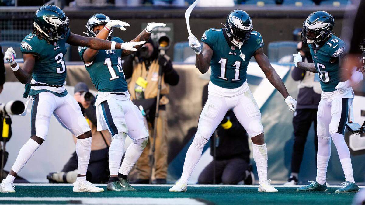 Philadelphia Eagles’ A.J. Brown, second from right, celebrates his touchdown with teammates during the second half of an NFL football game against the Tennessee Titans on Sunday.
