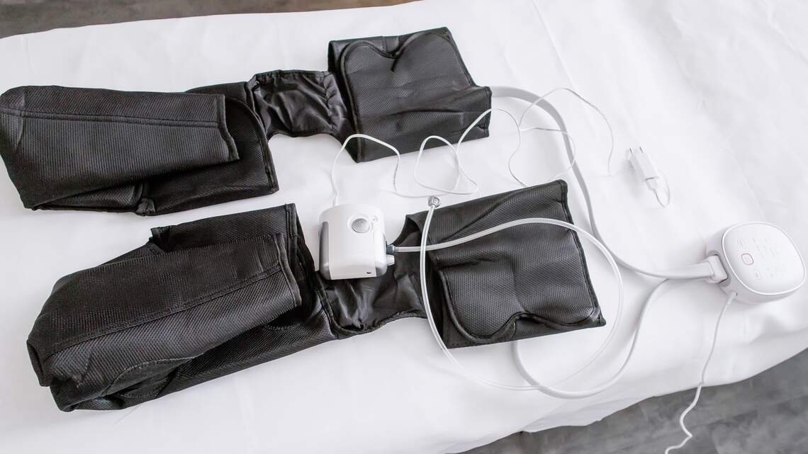 Compression boots vs. compression socks: How they differ and which one is right for you