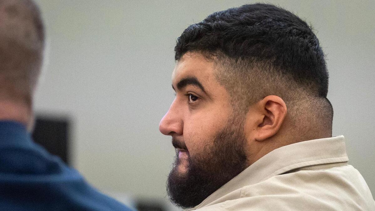 Defendant Peter Cardona sits with his lawyer during trial at the Tim Curry Criminal Justice Center in Fort Worth on Tuesday, Feb. 14, 2023. Cardona was convicted Thursday of murder in the 2020 shooting of Alfredo Olivares, 19.