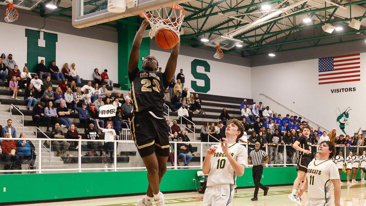 FW Eagle Mountain’s Avery Moss (23) flushes two of his 21 points against Benbrook in a Class 4A Division 2 bi-district game on Monday, February 17, 2025 at Azle High School. Eagle Mountain won 60-48.