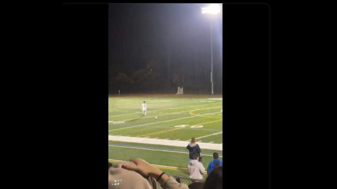 Soccer player Leo Giglio sets up a free-kick from 68 yards out.