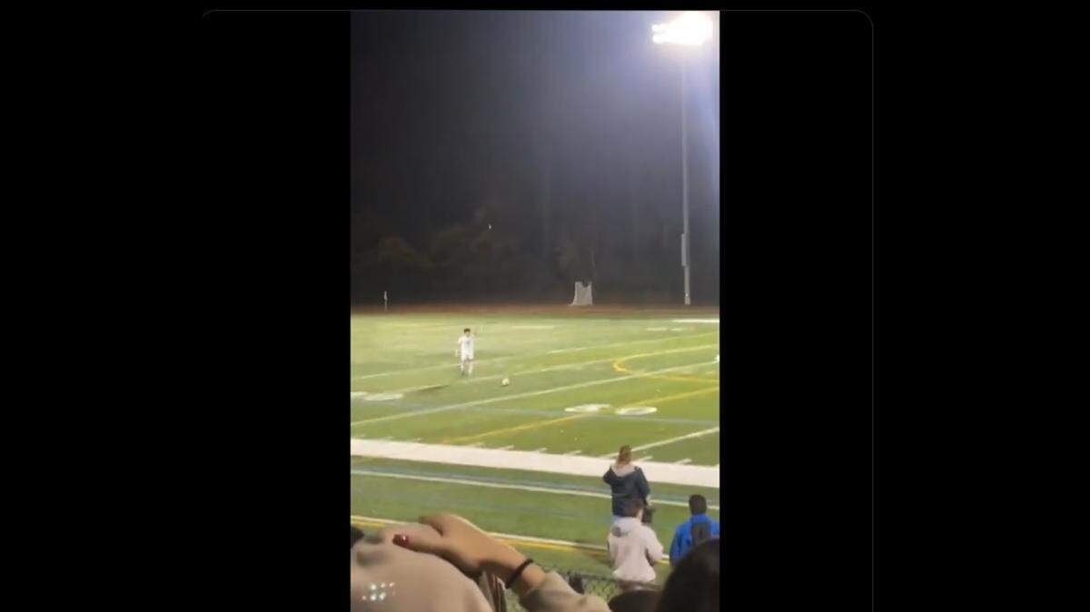 Soccer player Leo Giglio sets up a free-kick from 68 yards out.