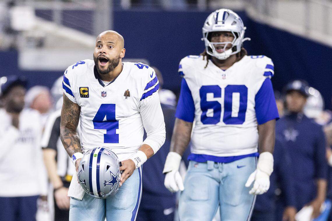 Cowboys quarterback Dak Prescott (4) reacts to a call from the officials in the second half of an NFL game between the Dallas Cowboys and the Philadelphia Eagles at AT&T Stadium in Arlington on Sunday, Nov. 23, 2025.