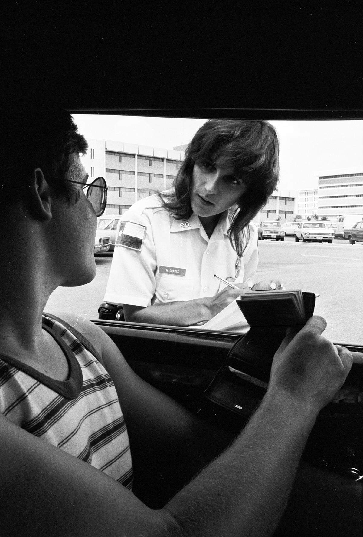 Sept. 8, 1975: University of Texas at Arlington police officer, Martha Graves, with UTA student John Wingler who agreed to pose for a photograph.