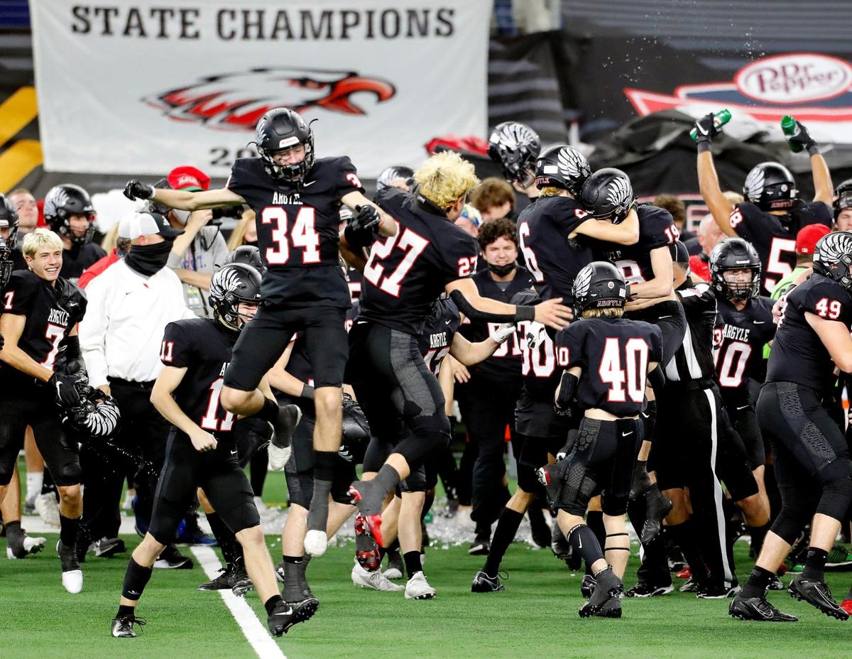 The Argyle Eagles celebrate their win of a Conference 4A Division 1 State Championship football game at AT&T Stadium in Arlington, Texas, Friday, Dec. 18, 2020. Argyle defeated Lindale 49-21. (Special to the Star-Telegram Bob Booth)