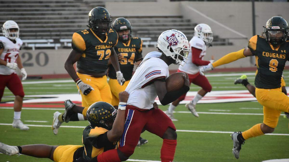 Carter Riverside and Western Hills battle it out at Farrington Field in Fort Worth, Texas, Friday, September 22, 2023. Western Hills won 39-25.