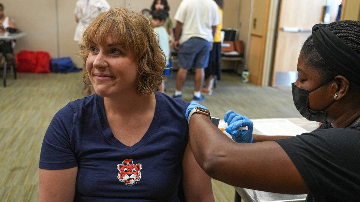 Jenna Garrison gets a flu shot at the second annual Austin Independent School District Showcase at the Palmer Events Center in September 2023 in Austin. Flu has been widespread in Tarrant County in 2025.