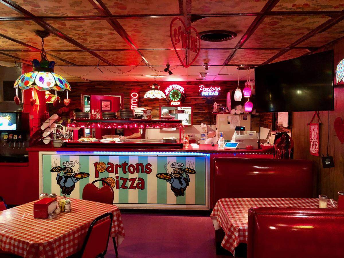 The Valentine’s Day decor last January at holiday-friendly Parton’s Pizza, a retro pizza buffet in west Fort Worth.