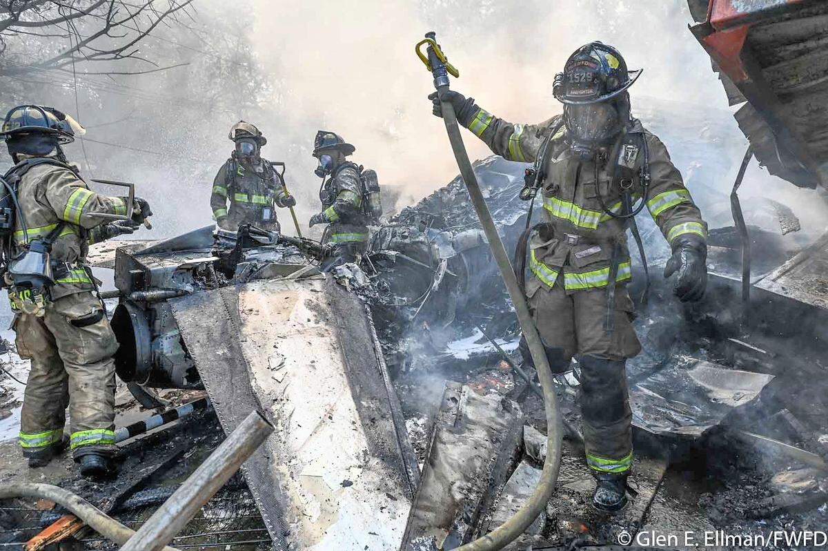Three homes were damaged when a military plane crashed in a Lake Worth neighborhood on Sunday, Sept. 19, 2021. Residents and local authorities say it’s a miracle no one was killed.