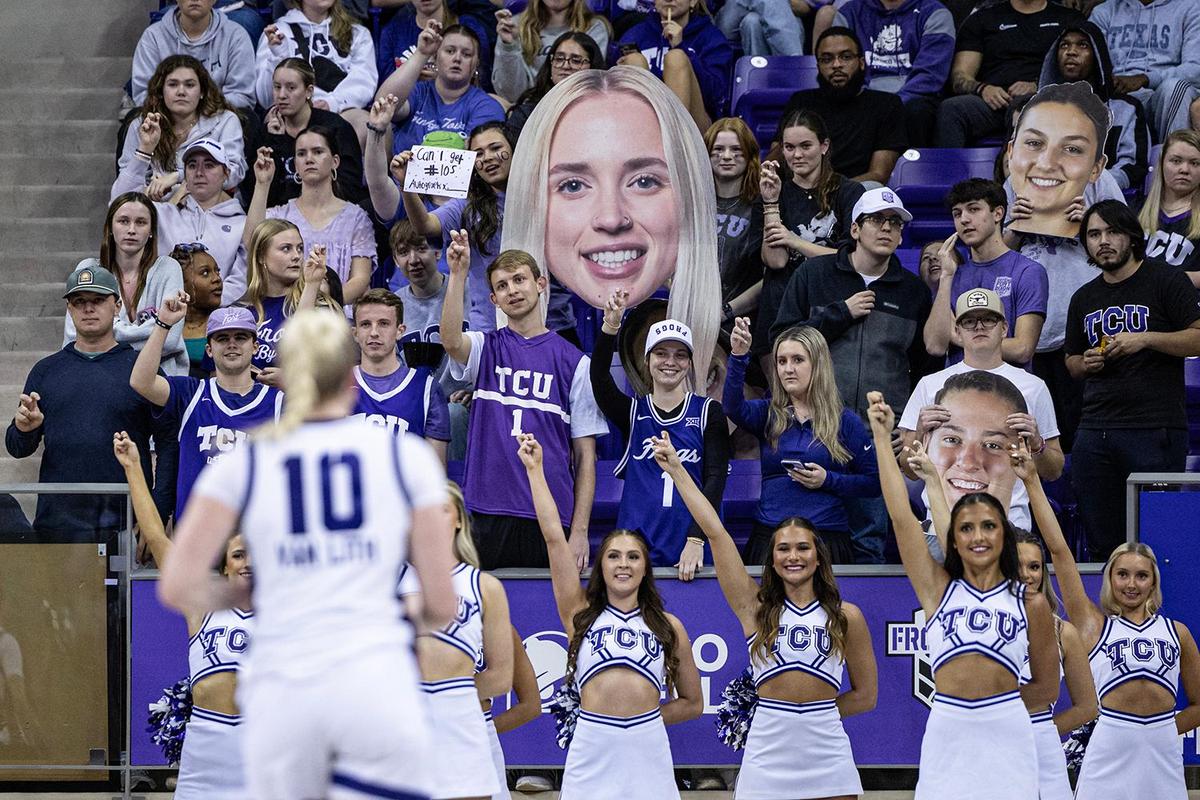 TCU guard Hailey Van Lith (10) runs back on defense as the student section holds up a sign of her face in the second half of an NCAA game between TCU and Houston at Schollmaier Arena in Fort Worth on Wednesday, Feb. 26, 2025.