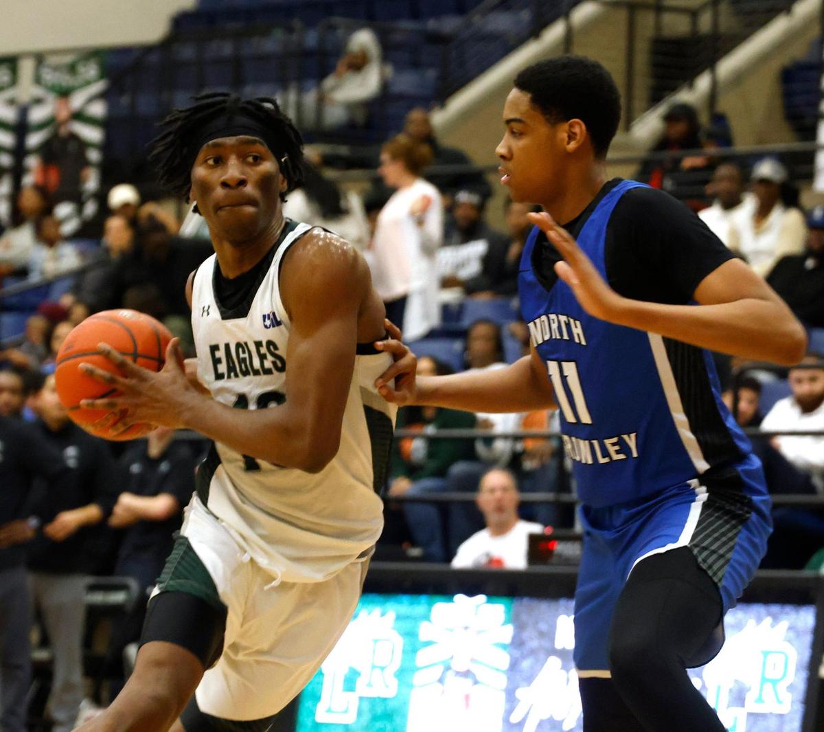 Lakeridge forward Ezenwa Nwakamma (10) enters the key in front of North Crowley forward Trey Hall (11) during a UIL boys basketball game at Lake Ridge High School in Mansfield, Texas, Tuesday, Jan. 24, 2025.