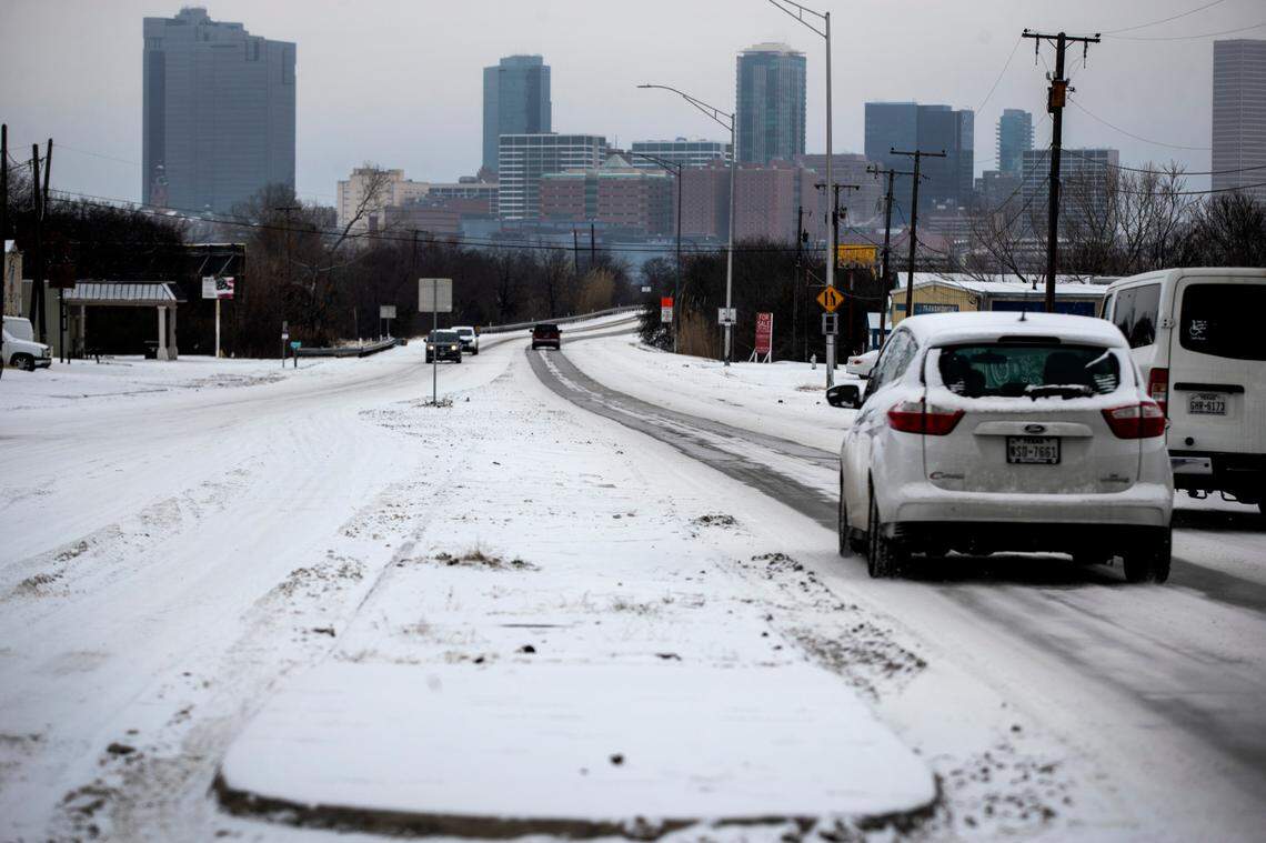 Streets are covered with snow after the region got another one to three inches of snow on Feb. 17, 2021, in Fort Worth.